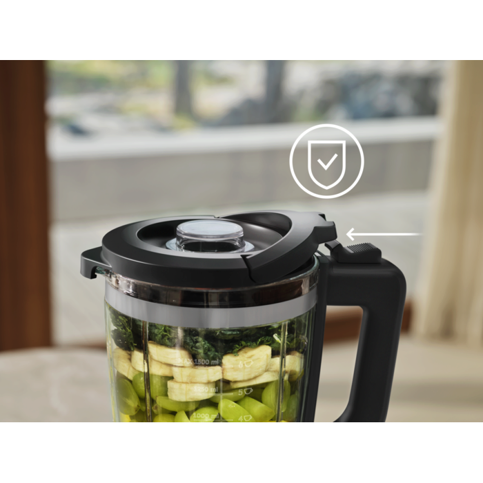 Interlock system keeps blades from turning with lid open.