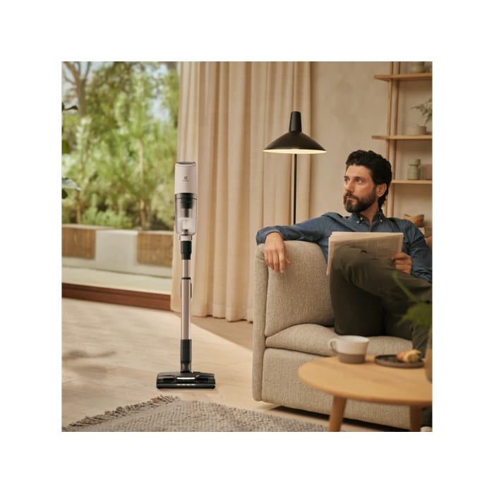 Vacuum cleaner in use in a home environment