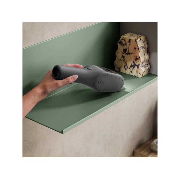 Product vacuuming fine dust on a shelf