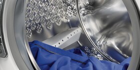 Schéma démontrant l'espace à laisser entre vos vêtements et le plafond du tambour.