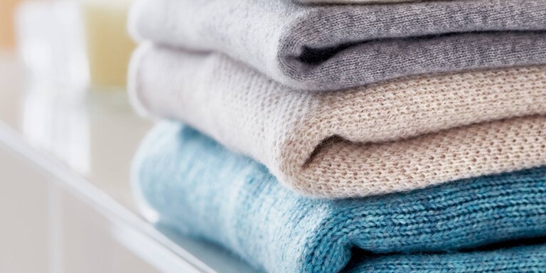 Pile de vêtements en laine